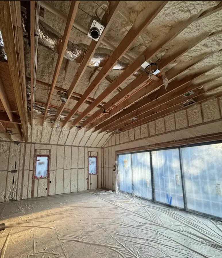 Interior walls and ceiling insulated with spray foam during new construction in Coeymans